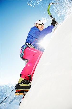 Female climber using ice pick Stock Photo - Premium Royalty-Free, Code: 649-09004653