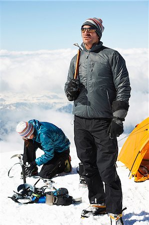 Mid adult couple by tent, Chamonix, France Stock Photo - Premium Royalty-Free, Code: 649-09004663