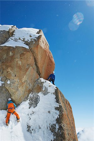 Two men mountain climbing, Chamonix, France Stock Photo - Premium Royalty-Free, Code: 649-09004681