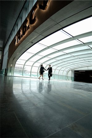 Handshake in airport arrivals Stock Photo - Premium Royalty-Free, Code: 649-09002353