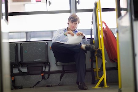 Man sitting in a bus Stock Photo - Premium Royalty-Free, Code: 649-09002520