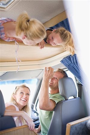 simsearch:632-03516993,k - Family smiling in RV Stock Photo - Premium Royalty-Free, Code: 649-09002659