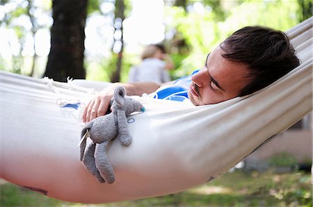 pictures of men sleeping in hammocks - Man sleeping in hammock outdoors Stock Photo - Premium Royalty-Free, Code: 649-09002789