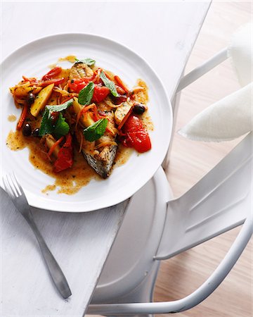 simsearch:649-09003190,k - Plate of fish tagine with tomato Foto de stock - Sin royalties Premium, Código: 649-09003243