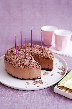 simsearch:649-09003121,k - Mousse cake with birthday candles Photographie de stock - Premium Libres de Droits, Code: 649-09003361