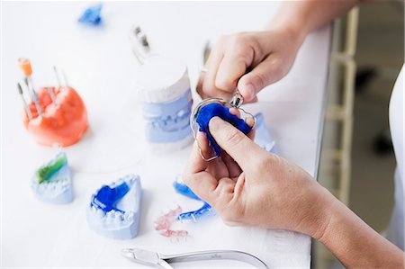 dental technician - Close up of scientist working in lab Stock Photo - Premium Royalty-Free, Code: 649-09003474