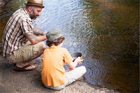 simsearch:649-07119820,k - Father and son panning for gold in river Stock Photo - Premium Royalty-Free, Code: 649-09003672