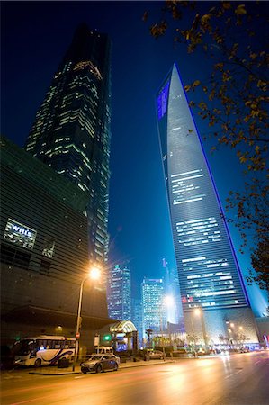 shanghai from below - City skyscrapers lit up at night Stock Photo - Premium Royalty-Free, Code: 649-09003791