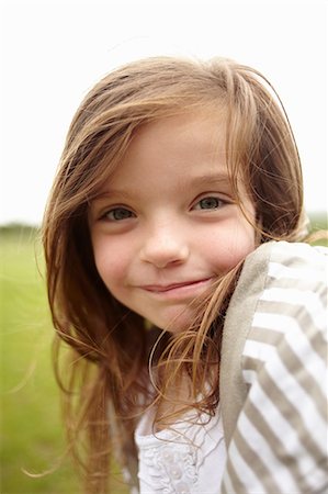 simsearch:649-09003830,k - Close up of girl's smiling face Stock Photo - Premium Royalty-Free, Code: 649-09003826