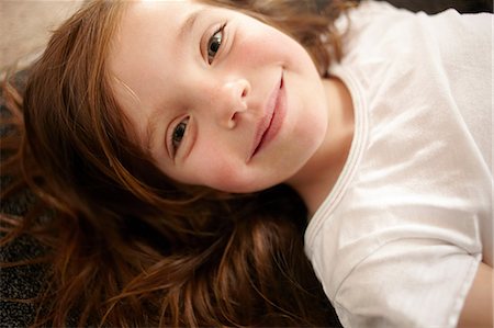 simsearch:649-09251433,k - Close up of girl's smiling face Photographie de stock - Premium Libres de Droits, Code: 649-09003841