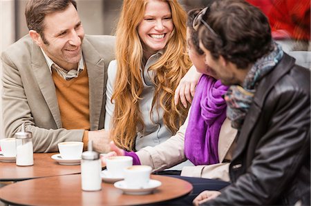 Couples having coffee at sidewalk cafe Stock Photo - Premium Royalty-Free, Code: 649-09003997