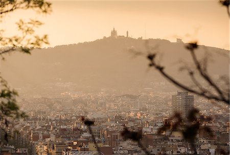 Elevated cityscape view to Tibidabo from Montjuic, Barcelona, Spain Fotografie stock - Premium Royalty-Free, Codice: 649-09016926