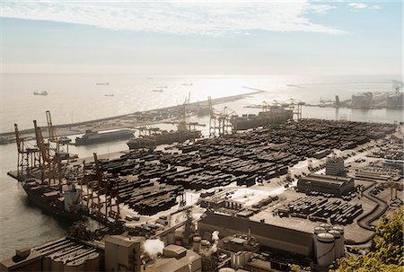 puerto (marítimo) - Elevated view of port ships and cranes, Barcelona, Spain Foto de stock - Sin royalties Premium, Código: 649-09016952