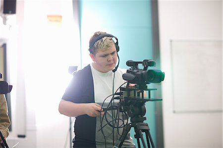 simsearch:649-09061548,k - Young male college student filming in TV studio Stock Photo - Premium Royalty-Free, Code: 649-09026215