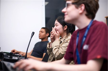 simsearch:6105-05953759,k - Young male and female college students at mixing desk in TV studio Stock Photo - Premium Royalty-Free, Code: 649-09026219