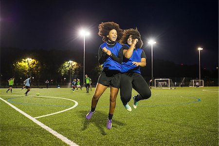 Female football players jubilant, Hackney, East London, UK Stock Photo - Premium Royalty-Free, Code: 649-09035861