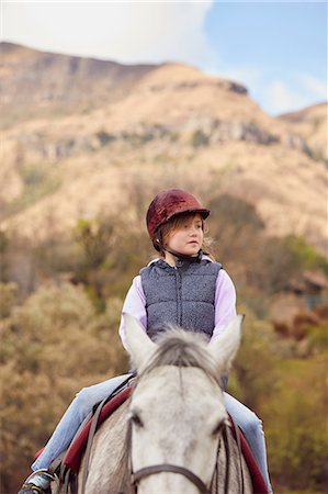 simsearch:649-09003830,k - Girl riding horse in rural setting Stock Photo - Premium Royalty-Free, Code: 649-09061473