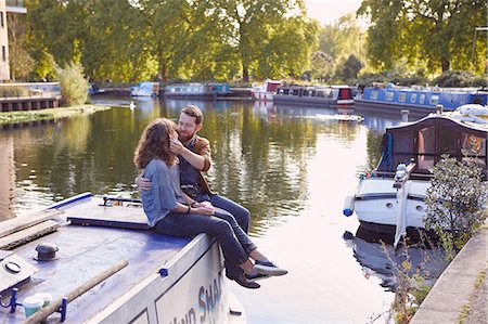 simsearch:649-09061651,k - Couple on canal boat Stock Photo - Premium Royalty-Free, Code: 649-09061648