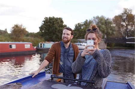 simsearch:649-09061651,k - Couple taking photo on canal boat Stock Photo - Premium Royalty-Free, Code: 649-09061658