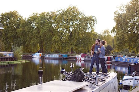 simsearch:649-09061651,k - Couple on canal boat Stock Photo - Premium Royalty-Free, Code: 649-09061650