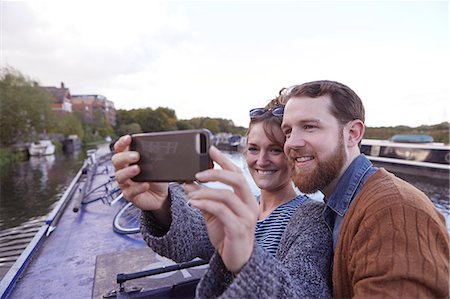 simsearch:649-09061651,k - Couple taking selfie on canal boat Stock Photo - Premium Royalty-Free, Code: 649-09061665