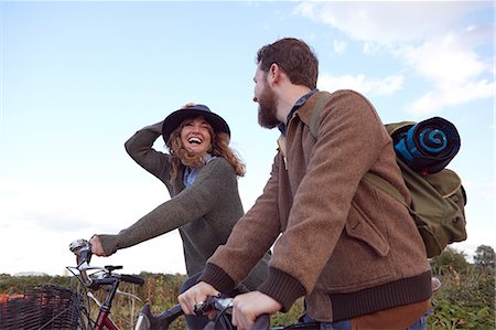Couple enjoying cycling on marshes Foto de stock - Sin royalties Premium, Código: 649-09061668