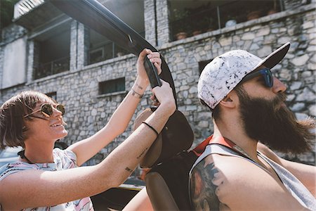 Young woman photographing from off road vehicle on road trip, Como, Lombardy, Italy Photographie de stock - Premium Libres de Droits, Code: 649-09078264