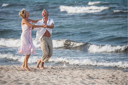 Couple dancing on beach, Palma de Mallorca, Spain Stock Photo - Premium Royalty-Free, Code: 649-09111177