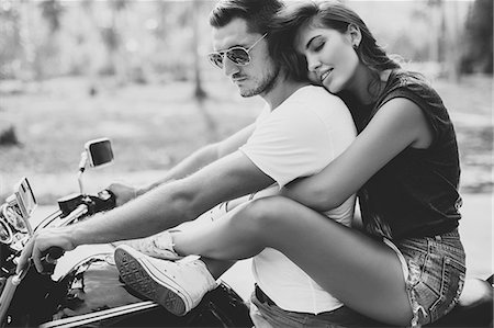 seducing men on bike - Young woman astride boyfriend on motorcycle, Krabi, Thailand, B&W Stock Photo - Premium Royalty-Free, Code: 649-09123877