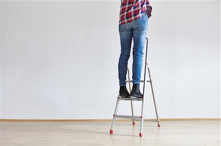 simsearch:614-02343903,k - Person standing on ladder Stock Photo - Premium Royalty-Free, Code: 649-09138794