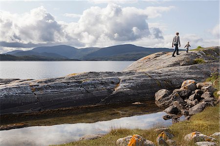 simsearch:649-08950535,k - Man and son walking on fjord rock formation, Aure, More og Romsdal, Norway Foto de stock - Sin royalties Premium, Código: 649-09138972