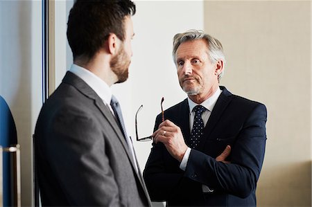 simsearch:614-06814076,k - Senior businessman meeting male colleague in office Stock Photo - Premium Royalty-Free, Code: 649-09139292