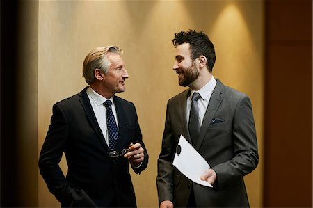simsearch:614-06814076,k - Two businessmen talking in office corridor Stock Photo - Premium Royalty-Free, Code: 649-09139317