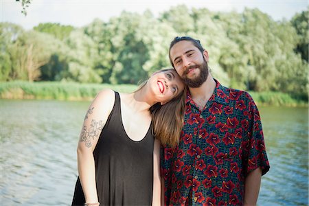 floral tattoo - Couple by lake, Arezzo, Tuscany, Italy Photographie de stock - Premium Libres de Droits, Code: 649-09148694