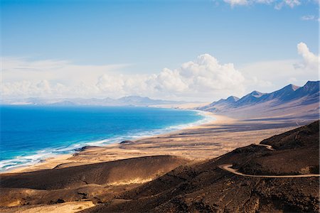 spain mountains blue sky - View to sea, Corralejo, Fuerteventura, Canary Islands Stock Photo - Premium Royalty-Free, Code: 649-09148721