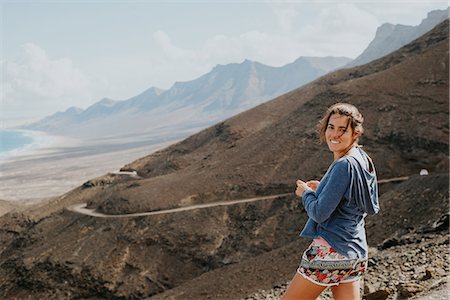 simsearch:649-09148718,k - Woman enjoying view to sea, Corralejo, Fuerteventura, Canary Islands Foto de stock - Sin royalties Premium, Código: 649-09148722