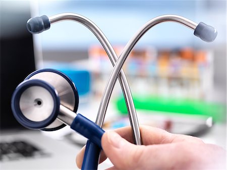 diagnosis - Cropped view of doctor holding stethoscope Stock Photo - Premium Royalty-Free, Code: 649-09148995