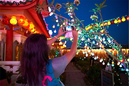 simsearch:649-09149399,k - Tourist taking photograph of light decorations, Kek Lok Si Temple, Penang Island, Malaysia Stock Photo - Premium Royalty-Free, Code: 649-09149399