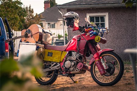 simsearch:649-09166665,k - Motorbike with belongings and guitar strapped to back, in preparation for trip Stock Photo - Premium Royalty-Free, Code: 649-09155800