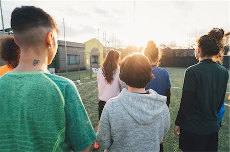 soccer team rear view - Football team on pitch Stock Photo - Premium Royalty-Free, Code: 649-09155824