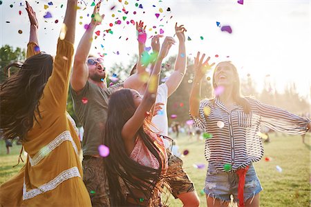 simsearch:649-08824082,k - Five young adult friends throwing confetti mid air at Holi Festival Stock Photo - Premium Royalty-Free, Code: 649-09166405
