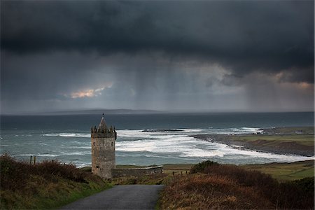 storm not jet not plane not damage not house not people - Stormy sky over Doonagore Castle, Doolin, Clare, Ireland Stock Photo - Premium Royalty-Free, Code: 649-09167017