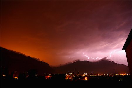 Lightning over Tramuntana mountains, Soller in foreground, Biniaraix, Mallorca, Spain Stock Photo - Premium Royalty-Free, Code: 649-09167209