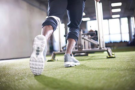 people wearing tennis shoes - Man doing sled training in gym Stock Photo - Premium Royalty-Free, Code: 649-09176879