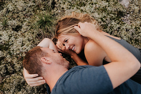 relaxing on vacation - Couple lying on moss Stock Photo - Premium Royalty-Free, Code: 649-09182039