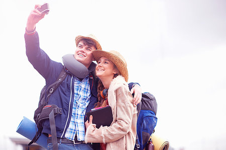 simsearch:649-07238918,k - Backpacker couple taking selfie Stock Photo - Premium Royalty-Free, Code: 649-09195562