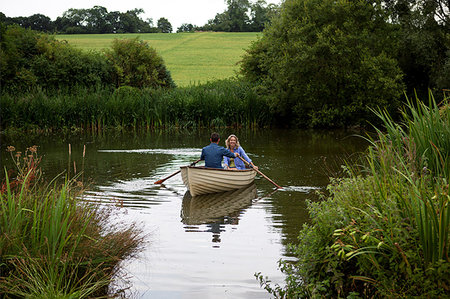 simsearch:649-07648467,k - Mature couple in rowing boat on rural lake Photographie de stock - Premium Libres de Droits, Code: 649-09195605