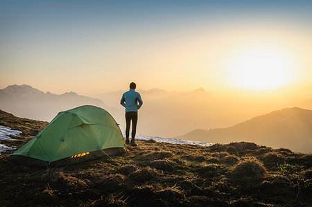 Hiker camping on French Alps, Parc naturel régional du Massif des Bauges, Chatelard-en-Bauges, Rhone-Alpes, France Stock Photo - Premium Royalty-Free, Code: 649-09196040