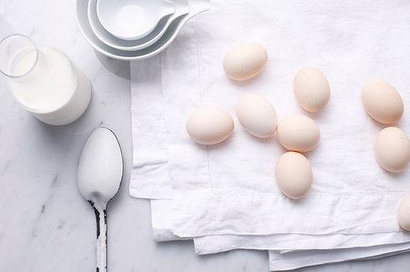 simsearch:600-07240806,k - Eggs, milk and spoon on table Photographie de stock - Premium Libres de Droits, Code: 649-09205998