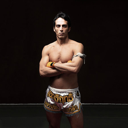 simsearch:6122-08229843,k - Boxer standing with arms crossed Stock Photo - Premium Royalty-Free, Code: 649-09206106